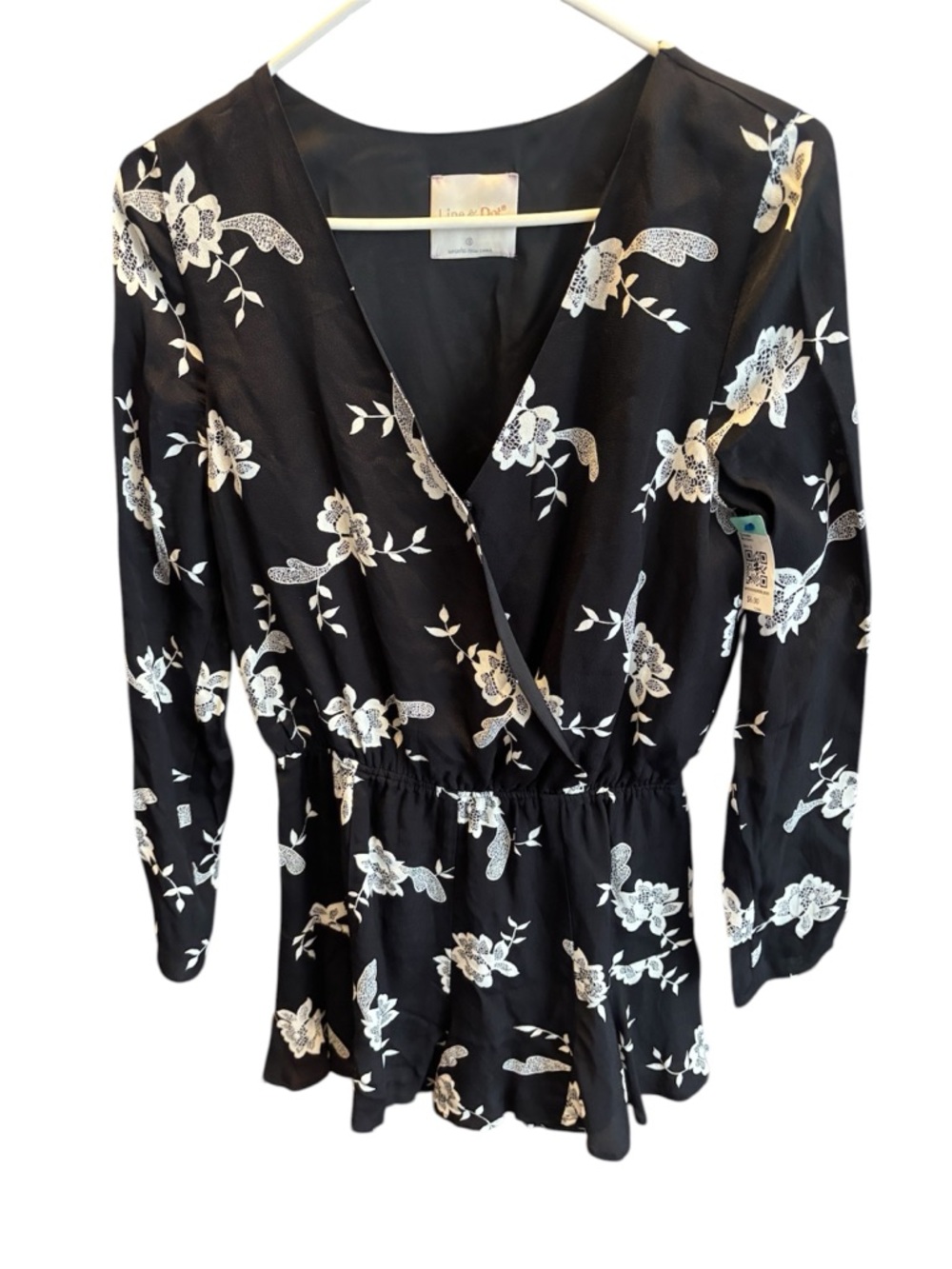Line & Dot Black Romper with White Floral Accents